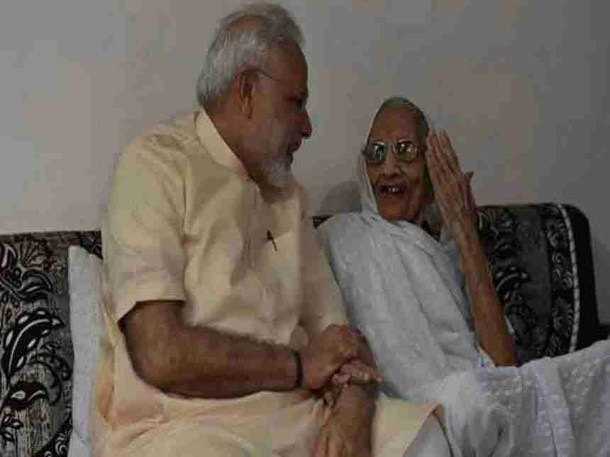 Narendra Modi's mother greets BJP supporters outside her house